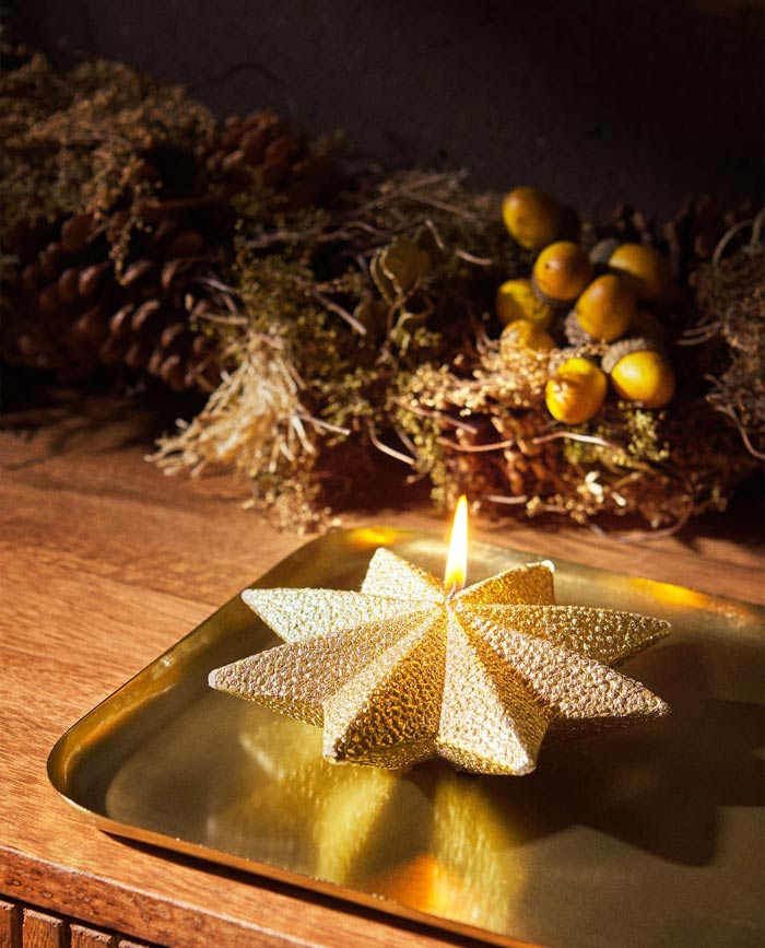 Gold star shaped candle